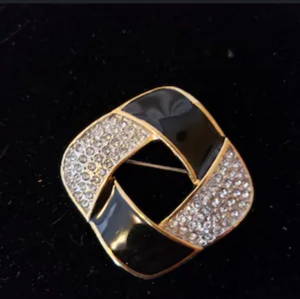 Vintage black and rhinestones brooch. Signed Butler